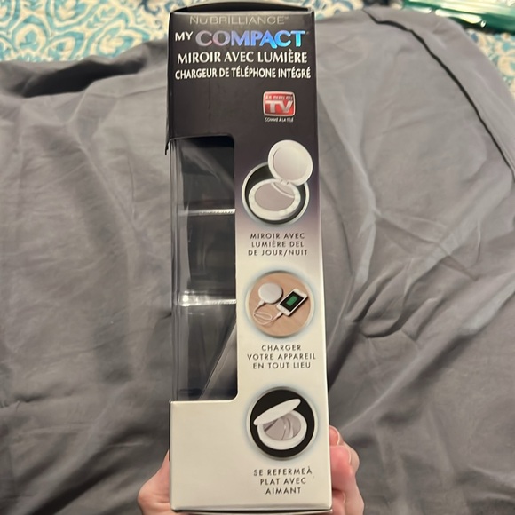 NuBrilliance My compact light up mirror w/built in phone charger. New in box. - Picture 4 of 4